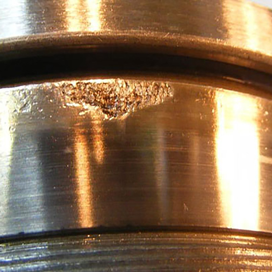 Flaking on the edge of a tapered roller inner ring