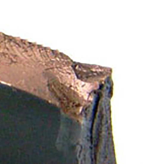 Fracture of a spherical roller bearing outer ring as a result of a high thrust impact load causing cracks