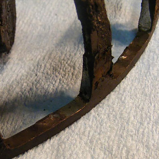 Wear of pocket surface. Brass cage pillar wear caused by lack of lubrication