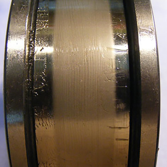 Pitting around the circumference of a cylindrical roller inner ring