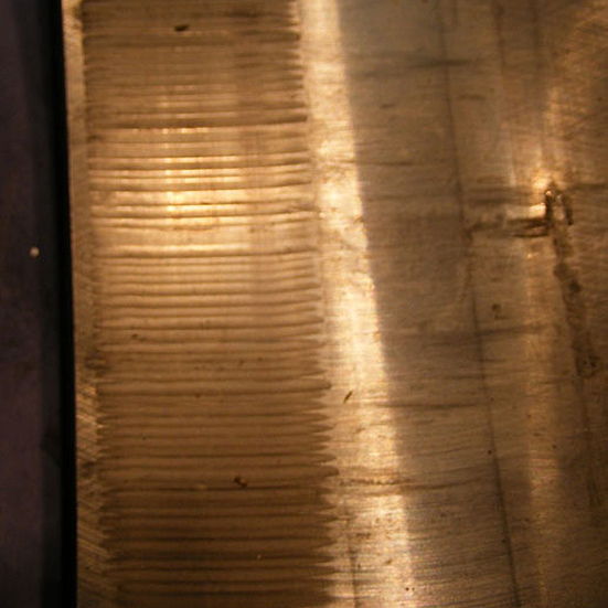 Electrical pitting in a spherical roller bearing